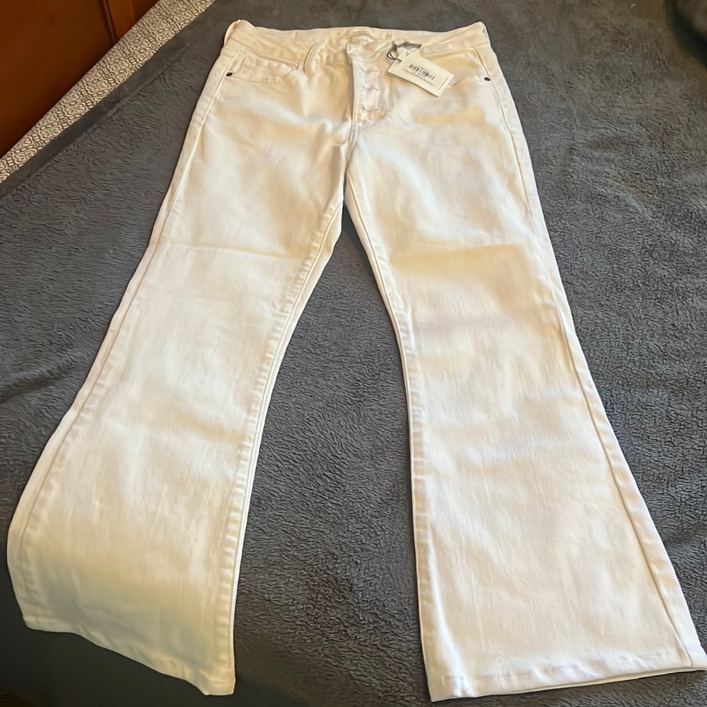 Button fly, white jeans